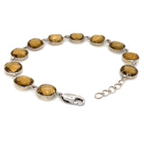 Pre-owned silver bracelet set with Smoky Quartz stones