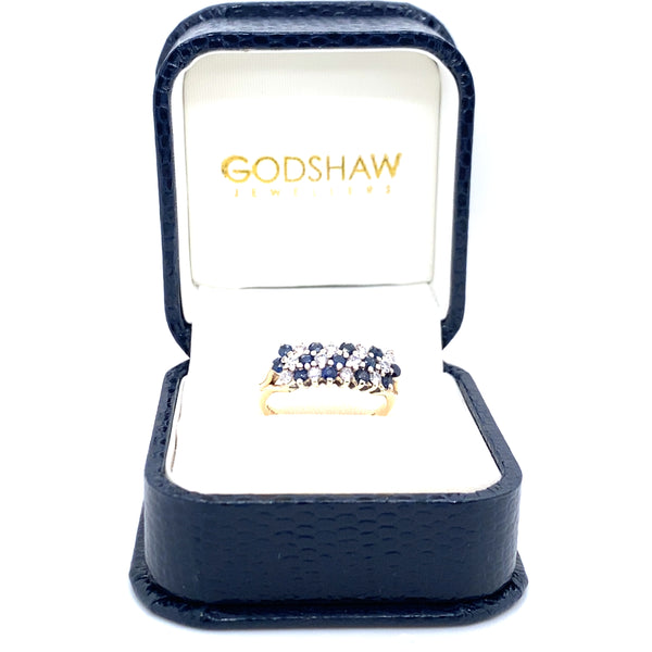 Pre-owned sapphire & diamond cluster ring