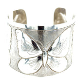 Prer-owned silver butterfly pattern bangle