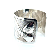 Prer-owned silver butterfly pattern bangle