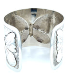 Prer-owned silver butterfly pattern bangle