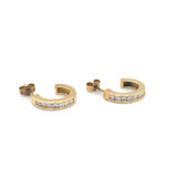 Gold hoop earrings with set with diamonds