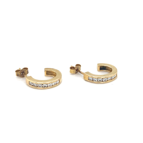 Gold hoop earrings with set with diamonds