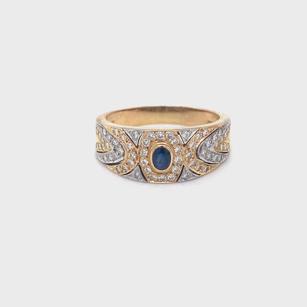 18ct gold ring set with Sapphire & Diamonds